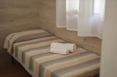 Letto o letti in una camera di Golden Beach Home Holiday