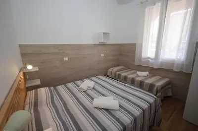 Letto o letti in una camera di Golden Beach Home Holiday