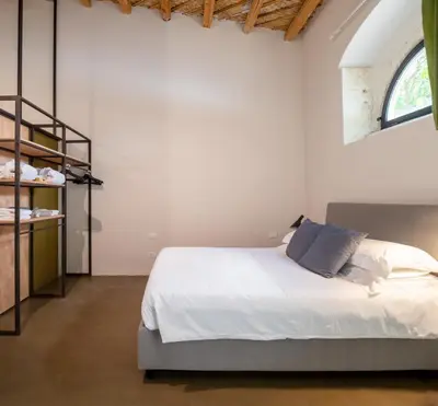 Letto o letti in una camera di PALAZZO TRIGONA DEPENDANCE