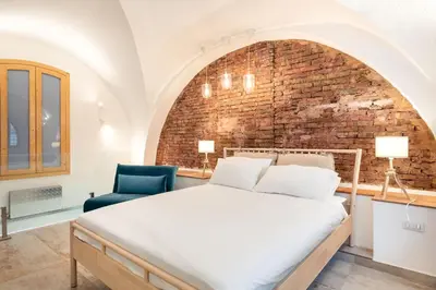 Letto o letti in una camera di Domus Pietri