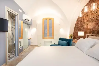 Letto o letti in una camera di Domus Pietri