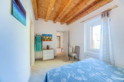Letto o letti in una camera di GuestHost - La Terrazza sul Tempio di Apollo