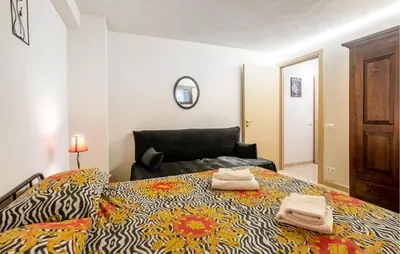 Letto o letti in una camera di Casa Mimì