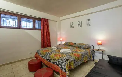 Letto o letti in una camera di Casa Mimì
