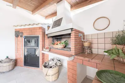 Cucina o angolo cottura di ISULATRAVEL - Villa Gloria