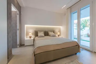Letto o letti in una camera di ISULATRAVEL - Villa Licia