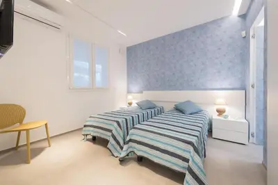 Letto o letti in una camera di ISULATRAVEL - Villa Licia