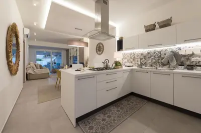 Cucina o angolo cottura di ISULATRAVEL - Villa Licia
