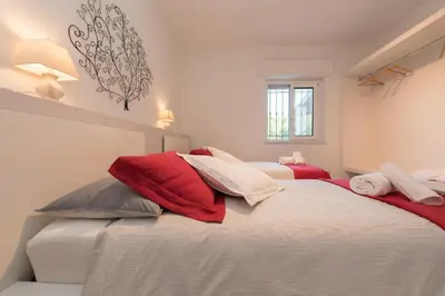 Letto o letti in una camera di ISULATRAVEL-Villa Zagara