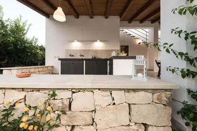 Cucina o angolo cottura di ISULATRAVEL-Villa Zagara