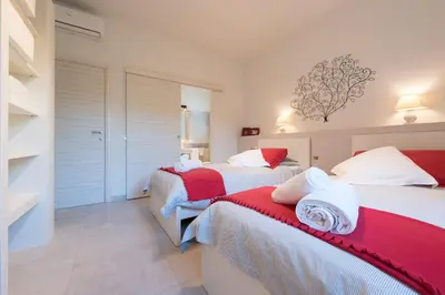 Letto o letti in una camera di ISULATRAVEL-Villa Zagara