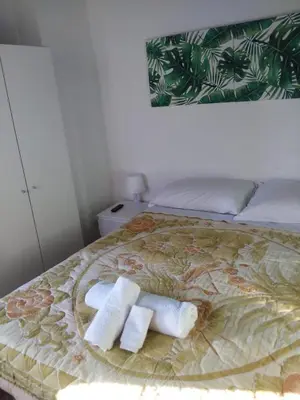 Letto o letti in una camera di B&B Piazza San Benedetto
