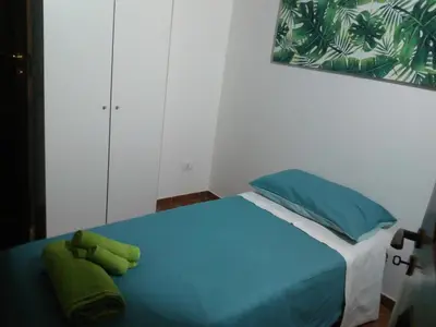 Letto o letti in una camera di B&B Piazza San Benedetto
