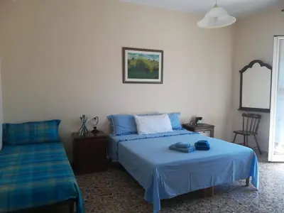 Letto o letti in una camera di Casa di Angela