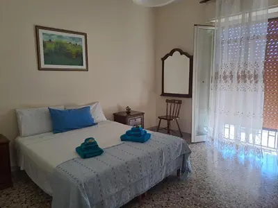 Letto o letti in una camera di Casa di Angela