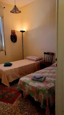 Letto o letti in una camera di Casa di Angela