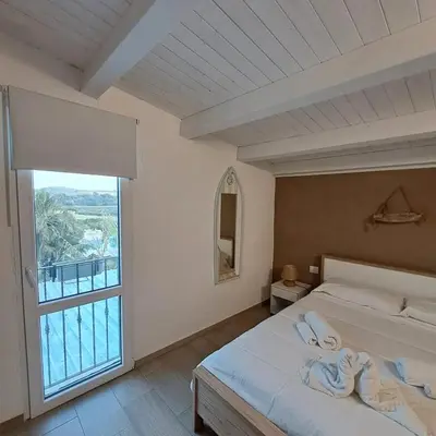 Letto o letti in una camera di LE 2 eMMe