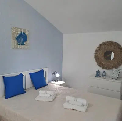 Letto o letti in una camera di LE 2 eMMe