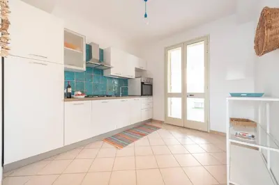 Cucina o angolo cottura di ISULATRAVEL - Blu Mediterraneo House