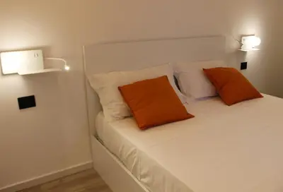 Letto o letti in una camera di Casa Gaudì