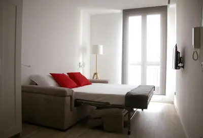 Letto o letti in una camera di Casa Gaudì