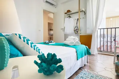 Letto o letti in una camera di Casa Vacanza Noban - CaseSicule