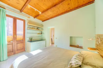 Letto o letti in una camera di GuestHost - Ortigia San Pietro Apartment