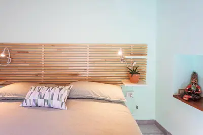 Letto o letti in una camera di GuestHost - Ortigia San Pietro Apartment