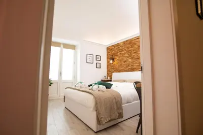 Letto o letti in una camera di La Dimora del Barbiere