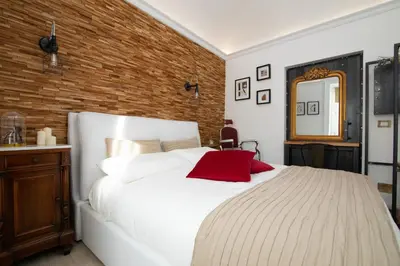 Letto o letti in una camera di La Dimora del Barbiere