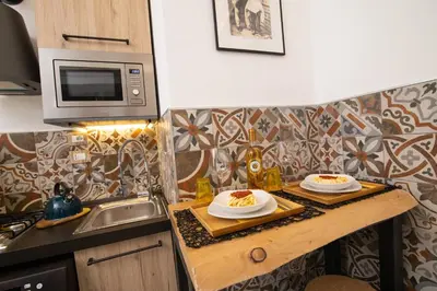 Cucina o angolo cottura di La Dimora del Barbiere