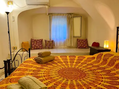 Letto o letti in una camera di Santa Maria Le Grazie House