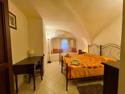 Letto o letti in una camera di Santa Maria Le Grazie House