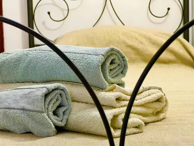 Letto o letti in una camera di Santa Maria Le Grazie House