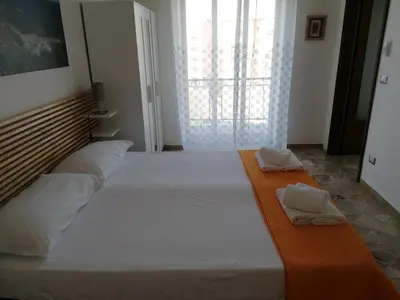 Letto o letti in una camera di A Ficurinia