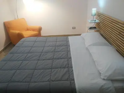 Letto o letti in una camera di A Ficurinia