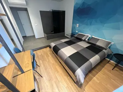 Letto o letti in una camera di Terrazza Sangiuliano