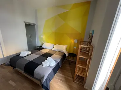 Letto o letti in una camera di Terrazza Sangiuliano