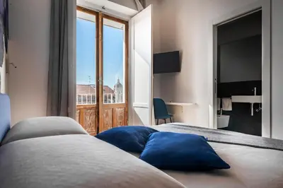 Letto o letti in una camera di Terrazza Sangiuliano