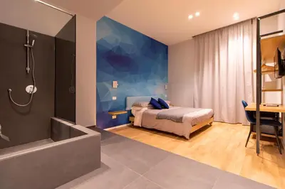 Letto o letti in una camera di Terrazza Sangiuliano