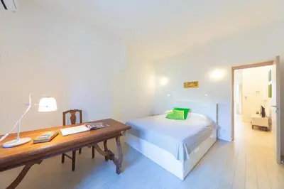 Letto o letti in una camera di GuestHost - Mercato di Ortigia Apartments