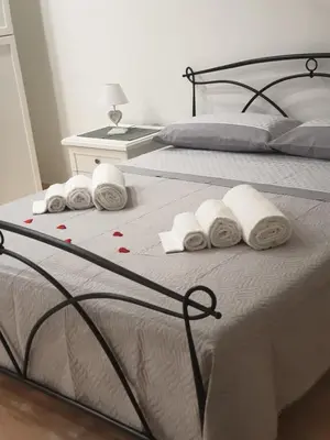 Letto o letti in una camera di Casa del Sole - Avola
