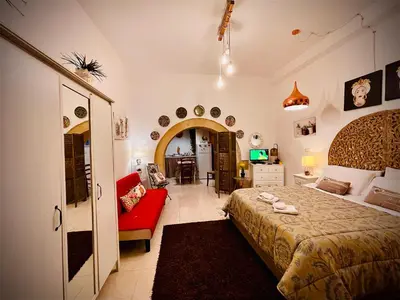 Letto o letti in una camera di Casa IL Tempio