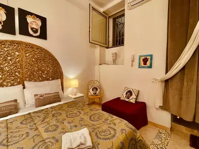 Letto o letti in una camera di Casa IL Tempio