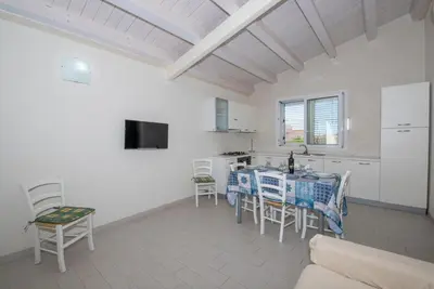 TV o dispositivi per l'intrattenimento presso Holiday Villa White