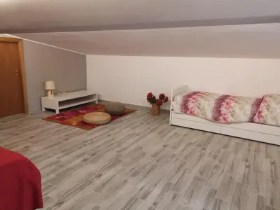 Letto o letti in una camera di Villa Engi