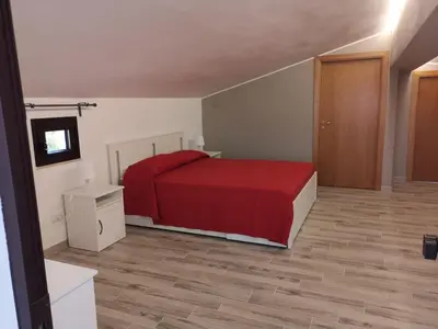 Letto o letti in una camera di Villa Engi
