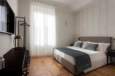 Letto o letti in una camera di Apollo Suite
