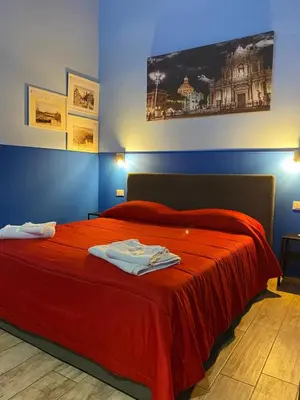Letto o letti in una camera di ZazzamitaHouse
