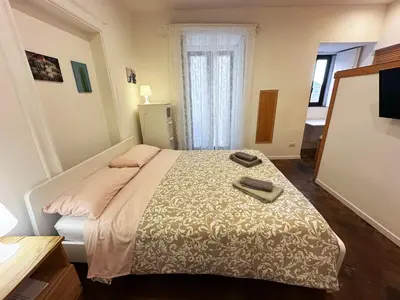 Letto o letti in una camera di A Casa di Ettore 